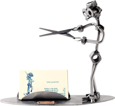 Hinz & Kunst smeedwerkfiguur "kapper visitekaartje"