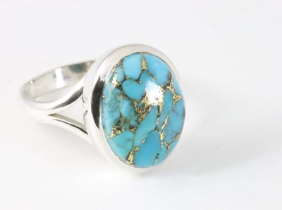 Ovale hoogglans zilveren ring met blauwe koperturkoois - maat 17