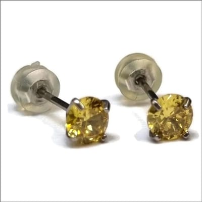 Aramat Jewels | Oorbellen | Ronde Titanium Oorbellen met Gele Zirkonia van Aramat | | | |5mm | Titanium | Kinderen, Volwassenen | Verkleurd niet