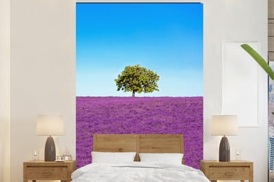 Behang - Fotobehang Boom - Paars - Lucht - Lavendel - Breedte 180 cm x hoogte 280 cm