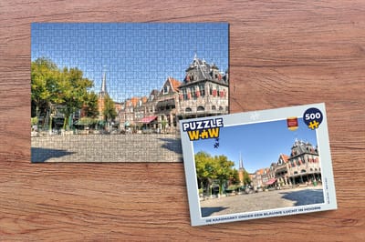 Puzzel De Kaasmarkt onder een blauwe lucht in Hoorn - Legpuzzel - Puzzel 500 stukjes
