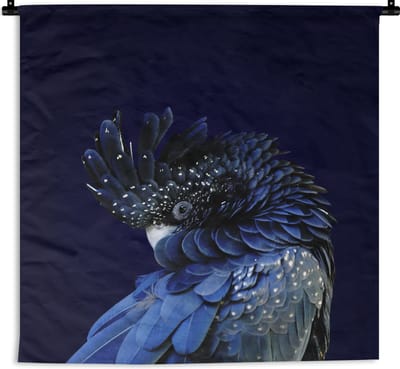 Wandkleed Kaketoes - Blauw gekleurde kaketoe met een donkere achtergrond Wandkleed katoen 150x150 cm - Wandtapijt met foto