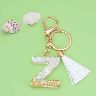 Letter Sleutelhanger A-Z – Luxe Initialen Sleutelhanger met Pompon & Kwastje – Tashanger voor Dames & Meisjes – Accessoire voor Sleutelbos, Handtas, Rugzak & Autosleutel – Persoonlijk Cadeau voor Vrouw, Moeder, Dochter & Vriendin