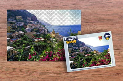 Puzzel Achter de bloemen valt het dorp Positano aan de Amalfikust te zien - Legpuzzel - Puzzel 1000 stukjes volwassenen