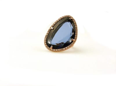 ring in zilver roze verguld model druppel gezet blauwe steen