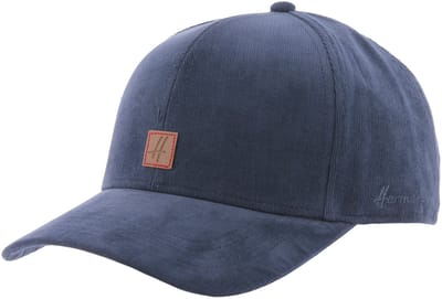 Herman blauwe baseballpet van fijn fluweel met een klein verstelbaar leren embleem op de achterkant.