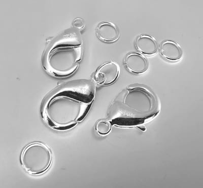 3 x 925 verzilverd - karabijnsluiting - L 16 mm - gratis - 6 verzilverd open ringetjes. Let op ( grote maat )