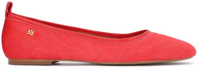 Red ballerinas made of leather with natural hair finish