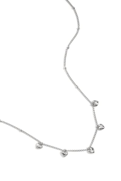 Minimalistische ketting met kleine hartjes - Goudkleur