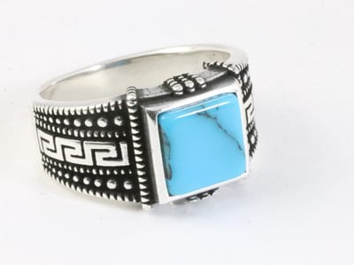 Bewerkte zilveren ring met blauwe turkoois - maat 20