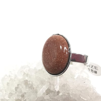 Ring - RVS - Goudsteen - Roodbruin - ovaal - Zilverkleurig - maat 16 - Spirituele betekenis: Goudsteen geeft kracht, energie en hoop, bevordert het een positieve kijk op het leven en werkt het opbeurend.