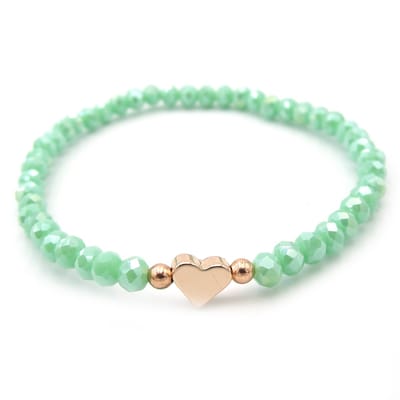 Kralenarmband mint groen en goud met 4mm kristal kraaltjes en rose-gold kleurig hartje - valentijnkado