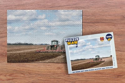 Puzzel De boer met een ploeg achter zijn tractor - Legpuzzel - Puzzel 1000 stukjes volwassenen