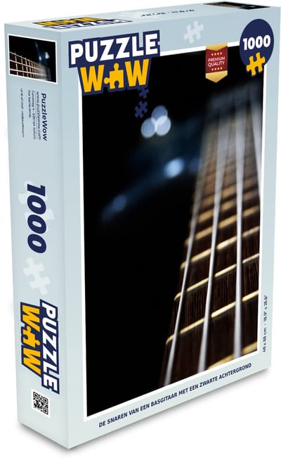 Puzzel De snaren van een basgitaar met een zwarte achtergrond - Legpuzzel - Puzzel 1000 stukjes volwassenen