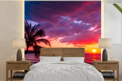 Behang - Fotobehang Zon - Horizon - Roze - Palmboom - Zee - Breedte 350 cm x hoogte 350 cm