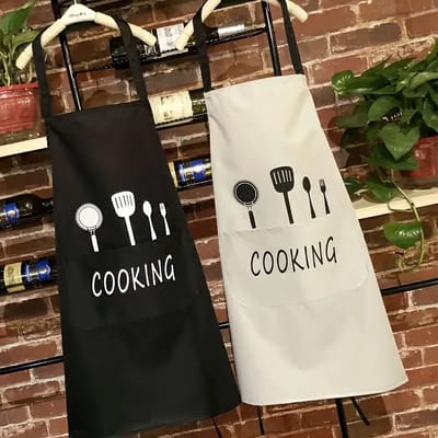Unisex keukenschort met tekst - zwart schort - 1 extra groot vak - 72.1 x 68 cm - unisex - kookschort - BBQ schort - water en olie bestendig - maat: one size fits all - IXEN