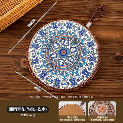 1 pièce de coussin isolant en céramique, surface en céramique et fond en liège avec corde de suspension, convient pour servir des assiettes, des tasses et des poêles. Diameter 17cm&Round
