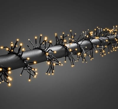 Konstsmide 6563-870 Clusterlichtketting met app Buiten Energielabel: E (A - G) werkt op het lichtnet Aantal lampen 960 LED Barnsteen Verlichte lengte: 7.2 m