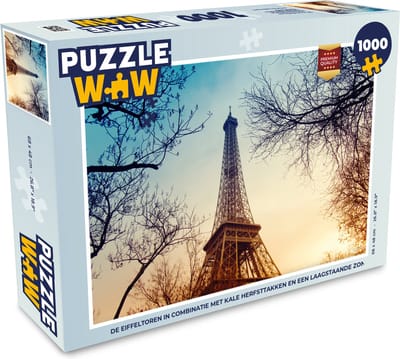 Puzzel De Eiffeltoren in combinatie met kale herfsttakken en een laagstaande zon - Legpuzzel - Puzzel 1000 stukjes volwassenen