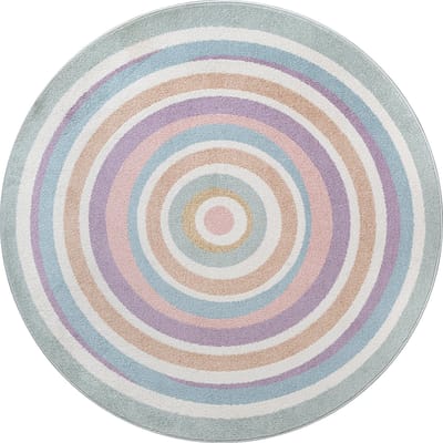 the carpet Beat Kids – Rond kindertapijt met regenboogringen – kleurrijk & zacht, multicolor regenboogringen op crème achtergrond – 120 cm rond
