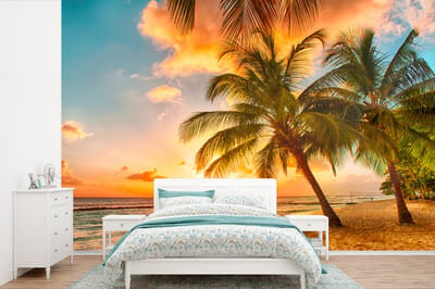 Behang - Fotobehang Zonsondergang - Palmboom - Wolken - Zee - Strand - Breedte 390 cm x hoogte 260 cm