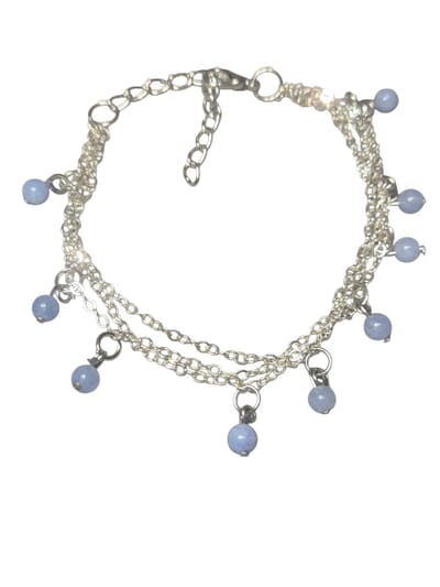 zilverkleurige 3 bangle armband met aquamarijn bedels.