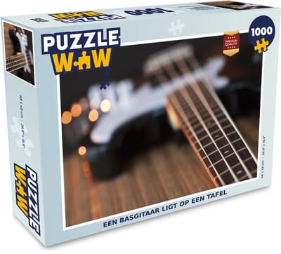 Puzzel Een basgitaar ligt op een tafel - Legpuzzel - Puzzel 1000 stukjes volwassenen