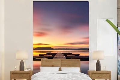 Behang - Fotobehang Steiger - Zonsondergang - Water - Zee - Reflectie - Breedte 145 cm x hoogte 220 cm
