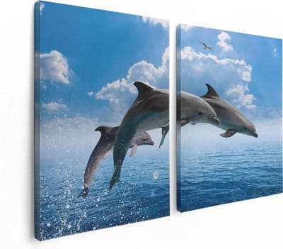Artaza Canvas Schilderij Tweeluik Dolfijnen Springen uit de Blauwe Zee - 120x80 - Foto Op Canvas - Canvas Print