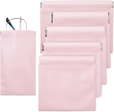 Drukzak in 6 maten van roze kunstleer met automatische sluiting voor sieraden, munten en accessoires