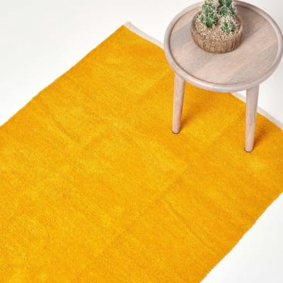 Homescapes mosterdgeel chenille vloerkleed met naturelkleurige rand van 100% katoen, 45 x 70 cm