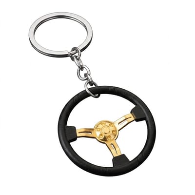 Zwart goudkleurige stuurwiel sleutelhanger metalen sleutelhanger dames en heren met rond stuur ontwerp en goudkleurig detail, decoratieve keychain voor autosleutel en tas