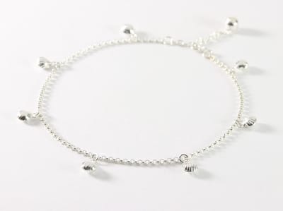 Fijne zilveren enkelband met schelpjes