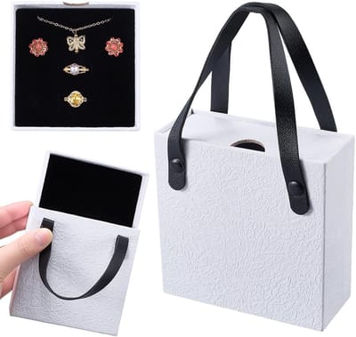 Draagbare sieradendoos van PU-leer met handvat, uittrekbare ringen en oorstekers voor het opbergen van oorbellen, armbanden en halskettingen, perfect voor cadeau's en organisatietips