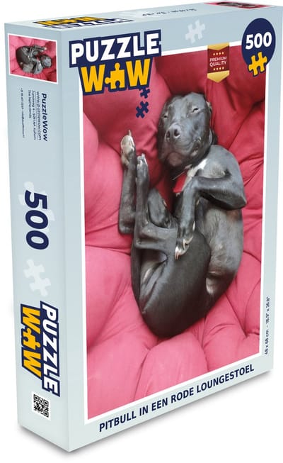 Puzzel Pitbull in een rode loungestoel - Legpuzzel - Puzzel 500 stukjes