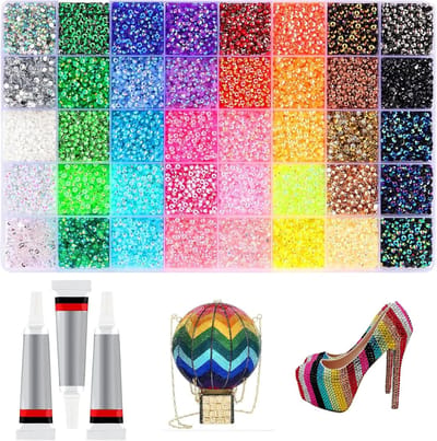 KZQ Deze set bevat 32.000 harssteentjes, drie flesjes lijm van 10 ml en gekleurde steentjes van 0,3 cm. Geschikt voor knutselprojecten zoals kleding, mokken, schoenen, textiel en nail art. 40 kleuren beschikbaar.