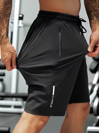 Zwarte voetbalbroeken heren maat L sport shorts elastische stretch pasvorm met ritszakken trekkoord korte trainingsbroek polyester fitness shorts zwarte stijl 1