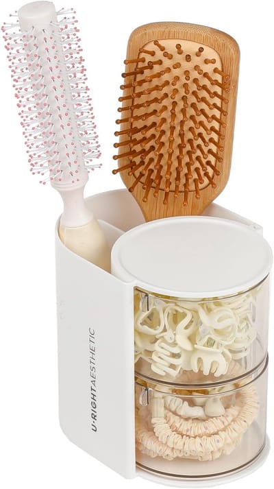 Een transparante, dubbellaagse opbergdoos voor haaraccessoires, compleet met een houder voor haarborstels, een draaibare doos voor kettingen en oorbellen, en een bureau-opbergdoos voor haaraccessoires en wattenstaafjes.