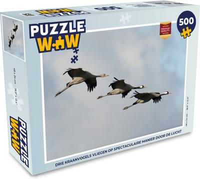 Puzzel Drie Kraanvogels vliegen op spectaculaire manier door de lucht - Legpuzzel - Puzzel 500 stukjes