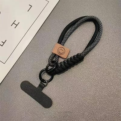 Coque de téléphone tissée Collision Cordon de suspension universel Pendentif court à tenir dans la main Bracelet polyvalent anti-chute Tendance Niche CANVAS noir
