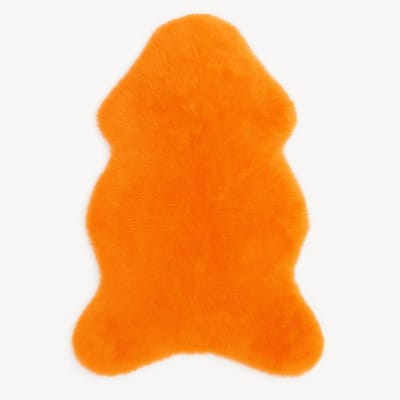 Texels oranje XL schapenvacht – echt & natuurlijk – stoel, bank of vloerkleed Skéépe vacht
