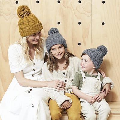 Warme Kabelgebreide Wintermuts – Melange Beanie met Pompon