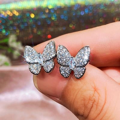 Huitan Boucles d'oreilles papillon tendance avec zircone cubique en cristal pour femmes Accessoires pour fille délicate Bijoux de mariage polyvalents gray