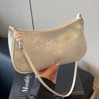 High-end Niche Tas voor Dames Nieuwe Mode Okseltas voor Dames Is Modieus Commuter Crossbody Schoudertas beige