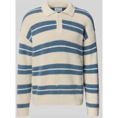 Gebreide pullover met polokraag en knoopsluiting