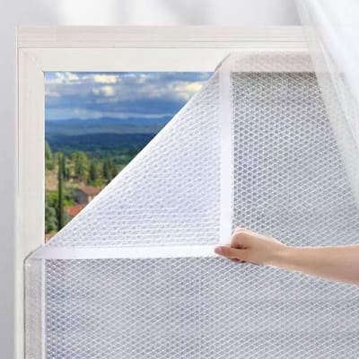 Verdikte dubbellaagse, afgedichte raamisolatiefolie, verdikte transparante winddichte en warmte-isolerende laag, beschermt tegen kou en wind in de winter, eenvoudig te installeren, 50*100 cm