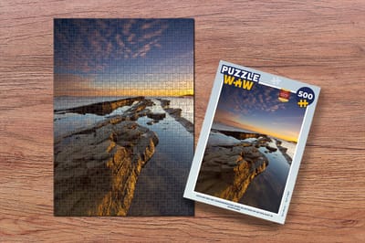 Puzzel Foto bij zee met zonsondergang over de rotsen op de Fife-kust in Schotland - Legpuzzel - Puzzel 500 stukjes