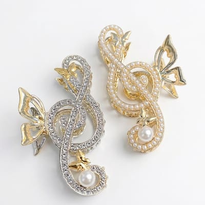 Goudkleurige haar clip set voor dames – 2 stuks decoratieve haar klem met strass details en parel accent – sierlijke opengewerkte haar accessoires
