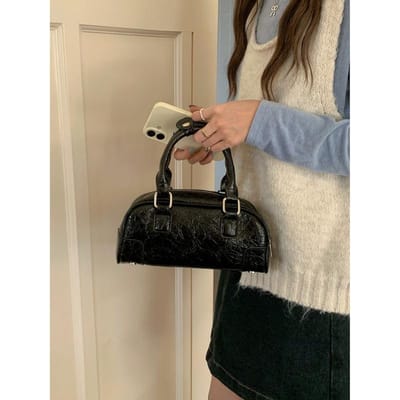 Koreaanse Niche Handgedragen Bowlingtas voor Dames Nieuwe Lente Mode Kussentas Ins Super Hot Crossbody Tas