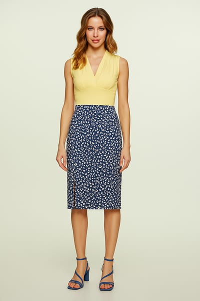 Crèmekleurige mouwloze jersey top met V-hals – stretchkatoenmix